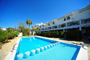 Orange Park Estudio Jardin vista piscina
